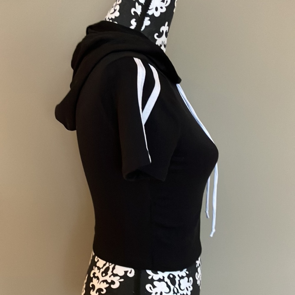 Cropped black top with hood and white stripes down each short sleeve - Picture 2 of 8